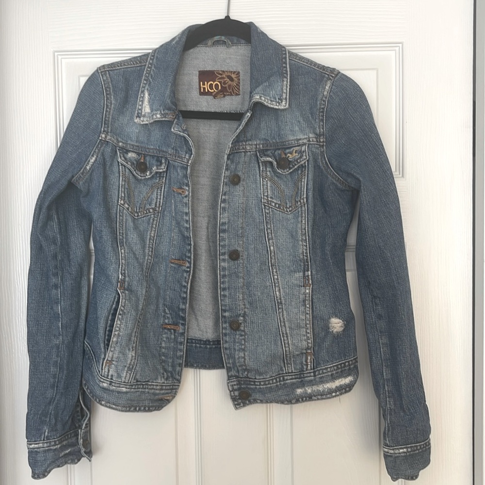 Distressed denim jacket